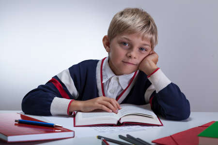 View of young student reading a bookの写真素材