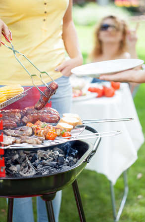 Time for barbecue in a garden, verticalの写真素材