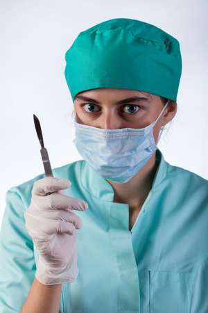 Vertical view of surgeon with a scalpelの写真素材