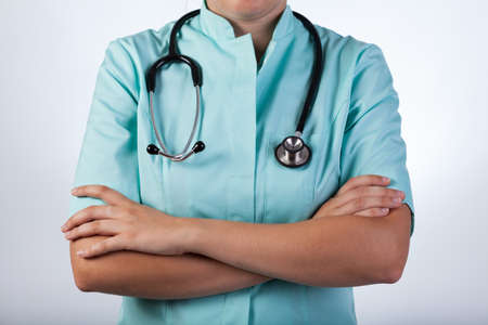 Horizontal view of doctor with founded handsの写真素材