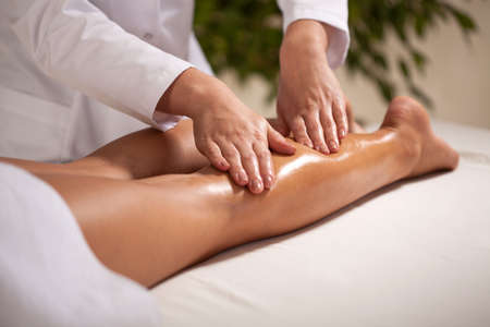 Horizontal view of calf massage in spaの写真素材