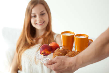 Man made a breakfast for woman, horizontalの写真素材