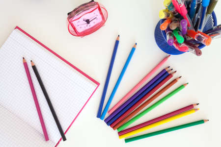 Tools for school children on white desk