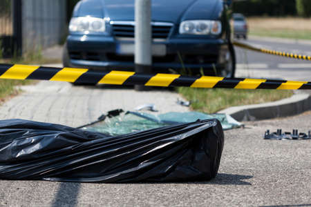 Human corpse on the accident area, horizontalの写真素材