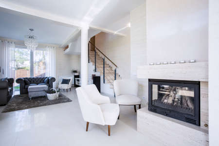 Interior of luxury living room with fireplace