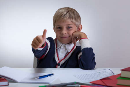 View of little student with okay gesture