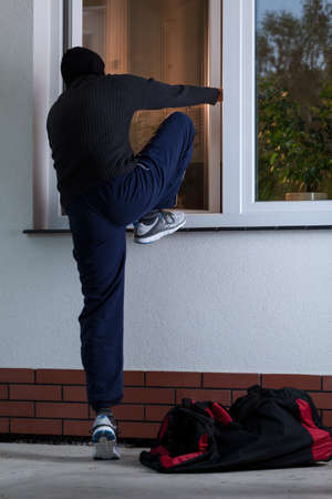 Vertical view of breaking into the houseの写真素材