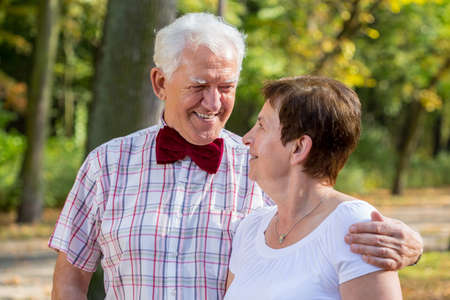 Elderly man in love looking at his wifeの写真素材
