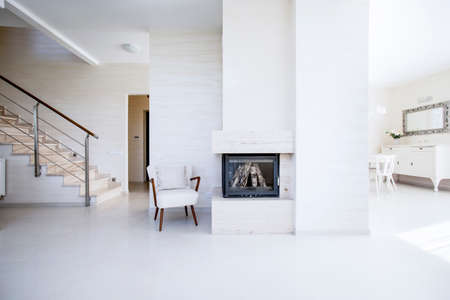 The fireplace in the open space inside the apartmentの写真素材