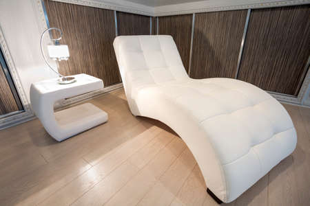Luxury modern chair in cozy room with wooden floor