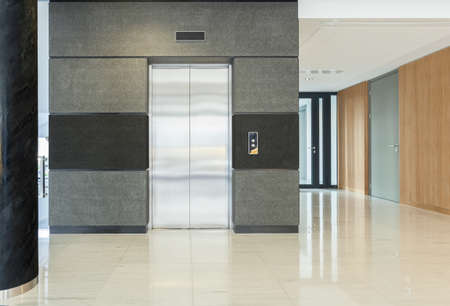 Empty hall of business building having elevatorの写真素材