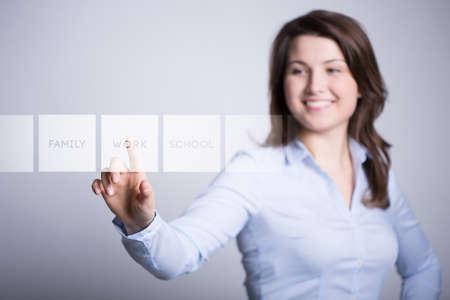 Girl with a work as a priorityの写真素材