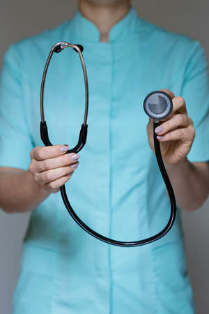 Vertical view of female doctor with stethoscopeの写真素材