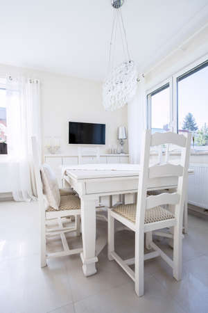 View of white table in dining roomの写真素材