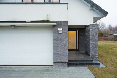 Horizontal view of entrance to detached houseの写真素材