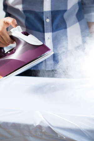 Picture of working steam ironの写真素材