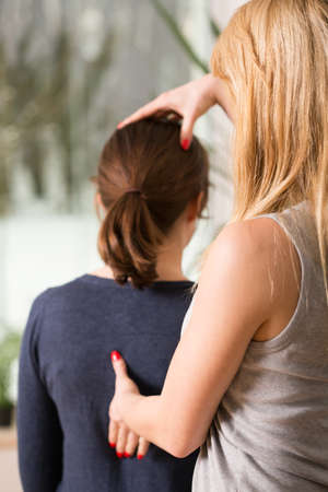 Young woman having her back manipulationの写真素材