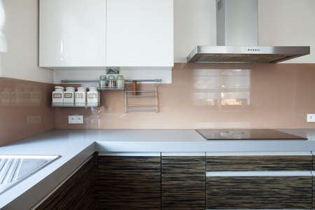 Horizontal view of kitchen with induction hobの写真素材
