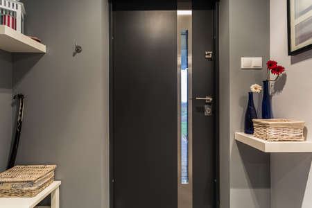 Modern black front door to new luxury house