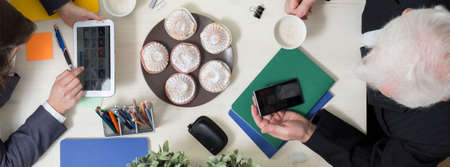 Panorama of using technology on business meeting