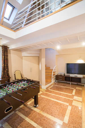 View of table football inside expensive house