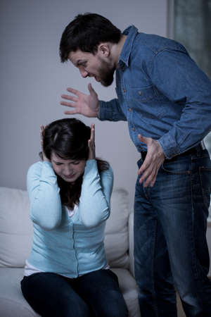 Loud quarrel between young married coupleの写真素材