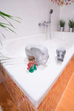 Close-up of bath toys on the bathtubの写真素材