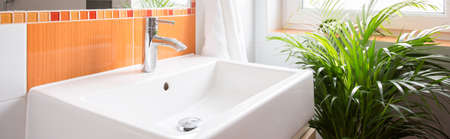 Close-up of washbasin in beauty color toiletの写真素材