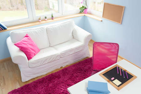 Little girl cute modern bedroom with white sofaの写真素材