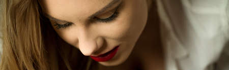 Close-up of young beautiful sexy blond womanの写真素材