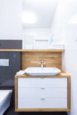 Vertical view of cupboard in luxury bathroomの写真素材