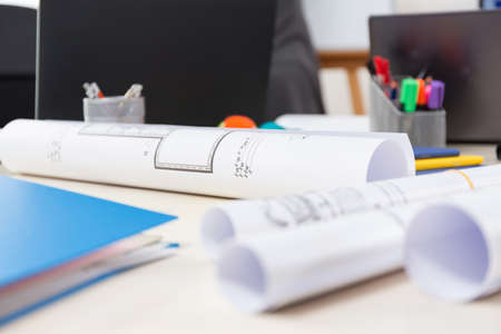 View of architectural projects on a deskの写真素材