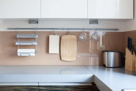 Close-up of wall in kitchen with cooking tools