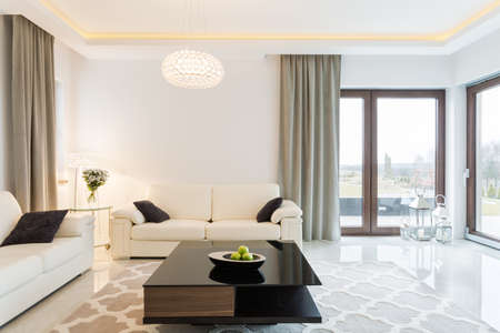 Cream sofa in luxury designed sitting room Cream sofa in luxury designed sitting room