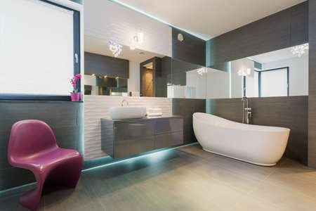 Horizontal view of contemporary exclusive bathroom interiorの写真素材