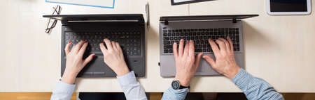 Elderly people using technology at their work