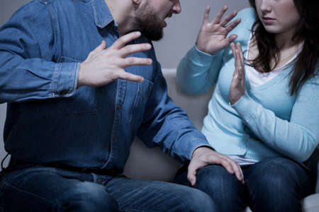 Violence at home - man trying to beat up his wife