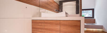 Close-up of wooden shelf in bathroom - panoramaの写真素材