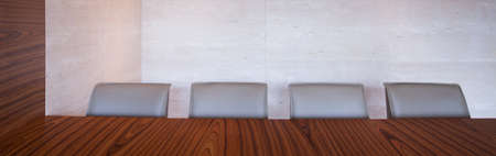 Wooden dining table and leather comfortable chairsの写真素材