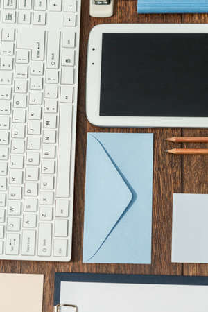 Photo of organized data for making notes lying on deskの写真素材