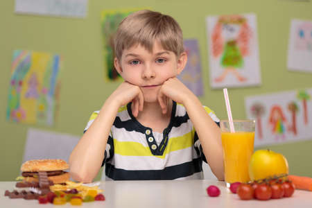 Hard decision - fast food or healthy food Hard decision - fast food or healthy food