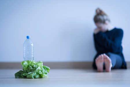 Girl with anorexia being on restricted dietの写真素材