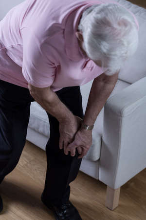 Elder man with joint diseaseの写真素材