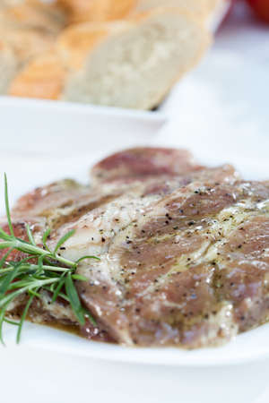 Closeup of seasoned porkneck prepared on grillの写真素材