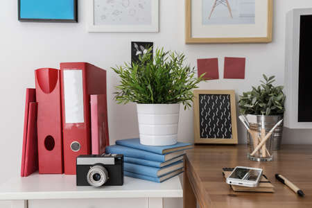 Close-up of materials for work in study room