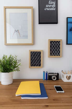 Two notebook on wooden table in study room
