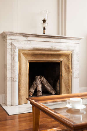 Designed marble fireplace in luxury living roomの写真素材