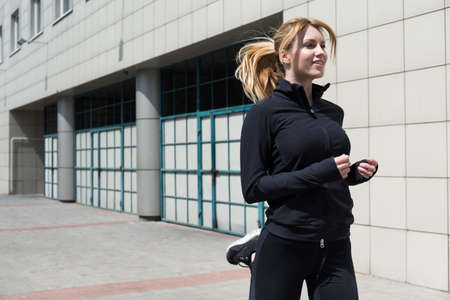 Sport gives satisfaction to the young woman