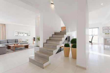 Minimalistic spacious house interior with two floorsの写真素材