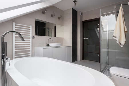Horizontal view of elegant beige bathroom interiorの写真素材